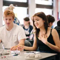 Two students at a table in a science class