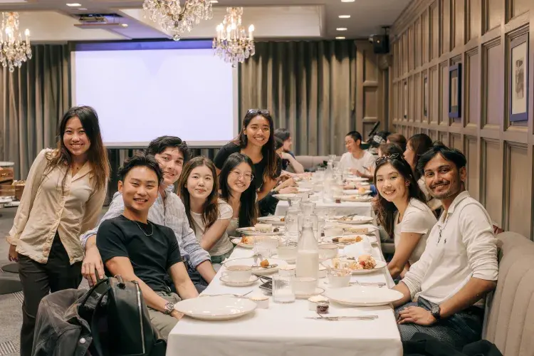 Group of summer school students enjoying afternoon tea at the Scotsman